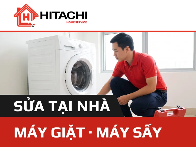 thợ ngồi xổm cạnh máy giặt cửa trước, hộp đồ nghề đỏ đặt dưới sàn — dịch vụ sửa máy giặt, máy sấy tại nhà
